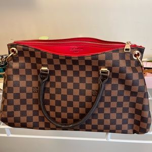 Women’s checkered brown leather handbag